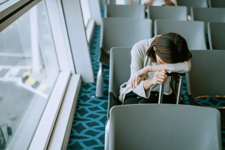 Women Sleeping and Waiting on airport