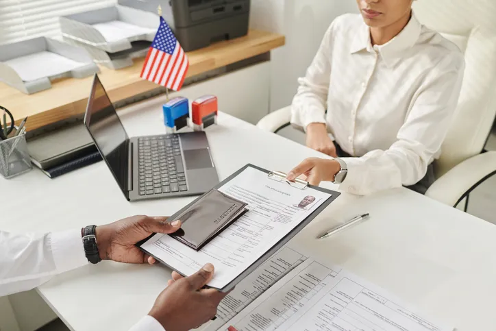 Specialist taking document to make visa