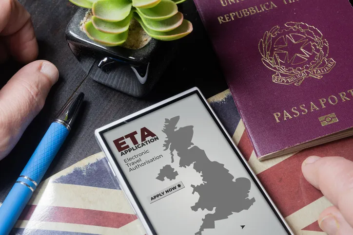 UK Electronic Travel Authorisation concept: man apply for ETA