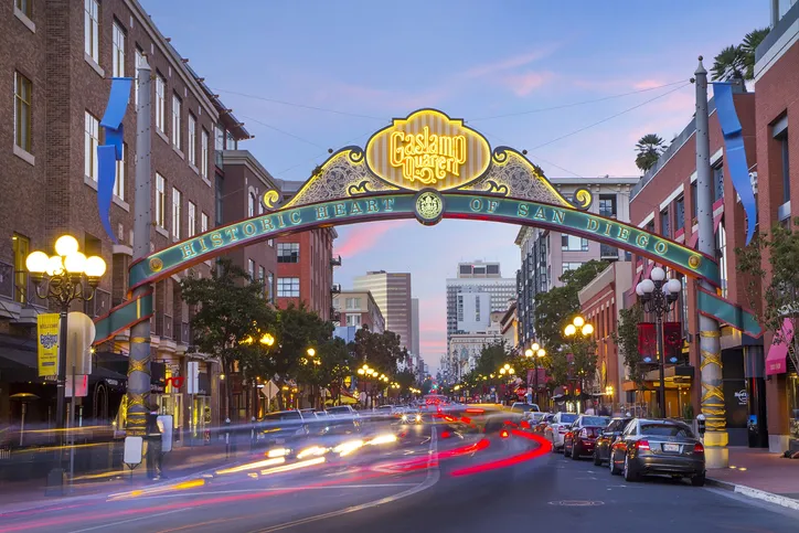 Downtown San Diego Gaslamp sign over moving traffic