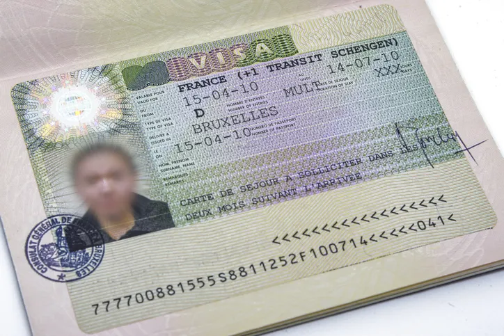 Close up of an European Schengen visa allowing the passport holder to travel inside the Schengen treaty territory