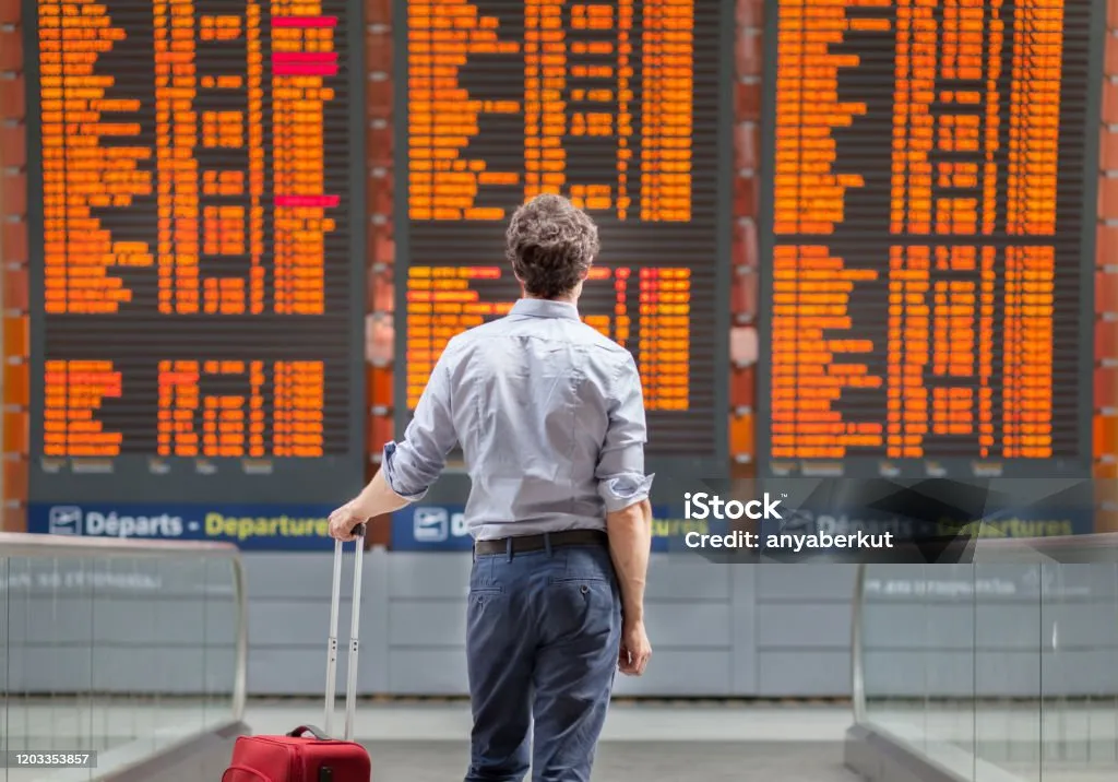 Traveling by international flight, person passenger waiting at the airport