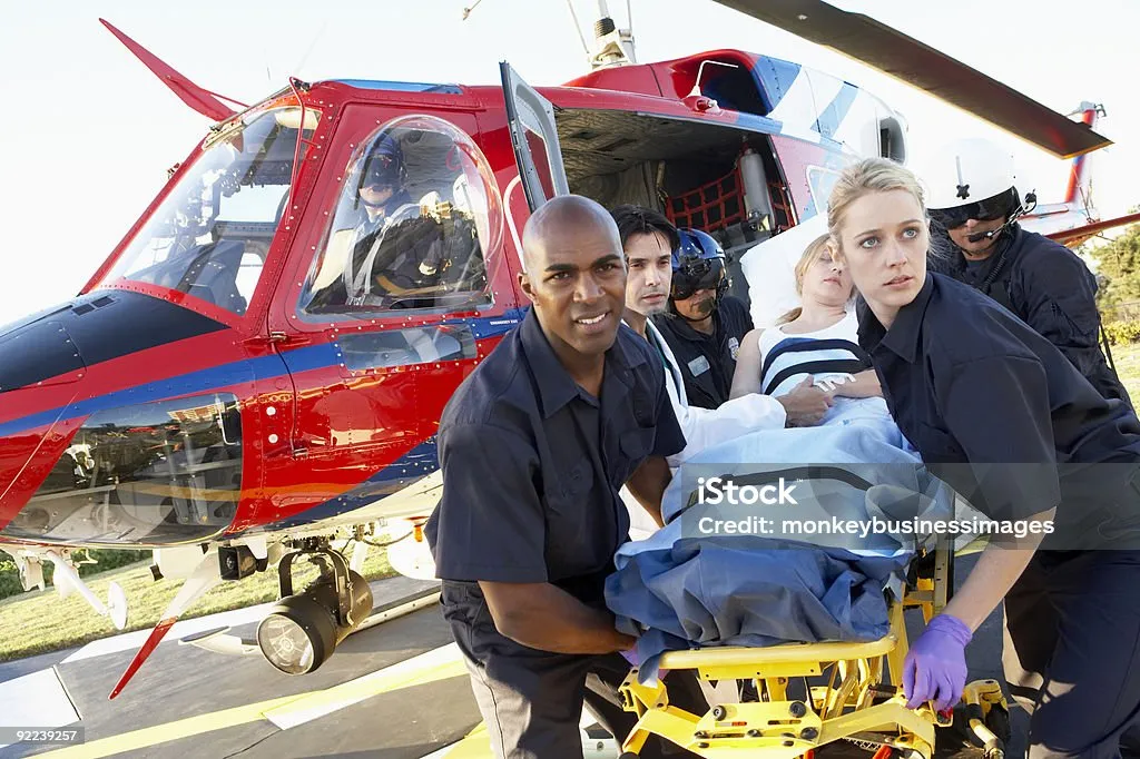 Paramedics unloading patient from Medevac